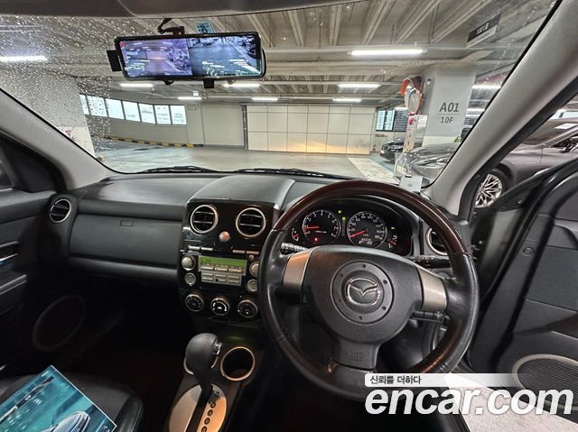 Mazda Verisa 2006 — photo 11