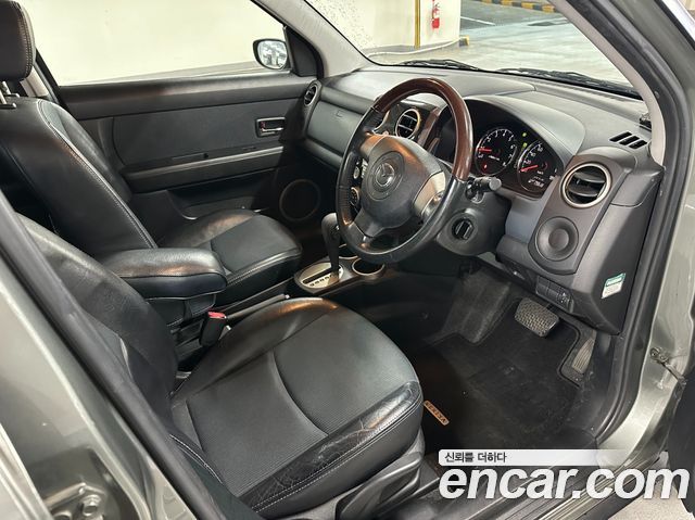 Mazda Verisa 2006 — photo 14