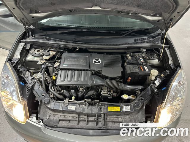 Mazda Verisa 2006 — photo 18
