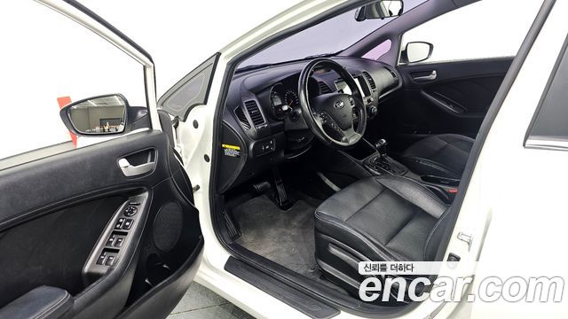 Kia K3 2013 — photo 10