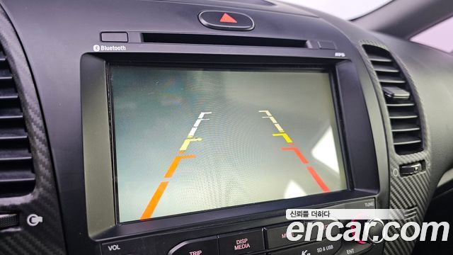 Kia K3 2013 — photo 15