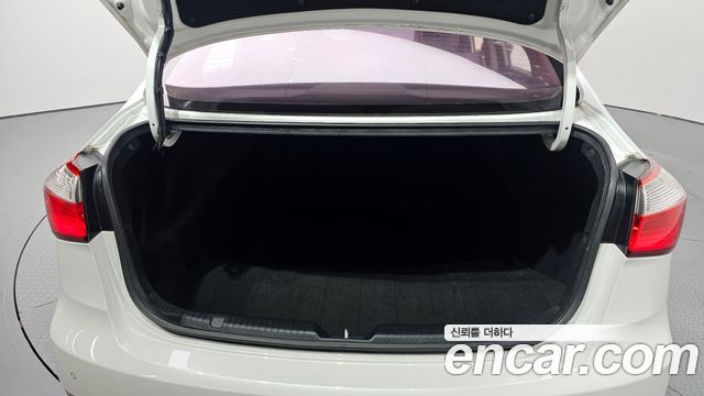 Kia K3 2013 — photo 17