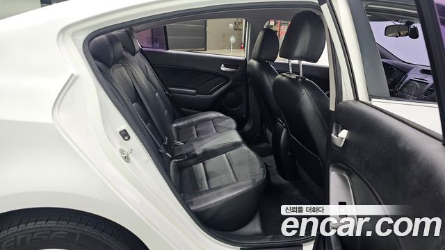 Kia K3 2013 — photo 18