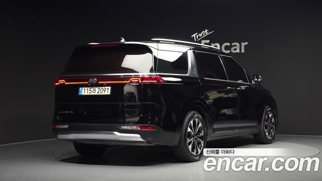 Kia Canival 2021 — photo 2
