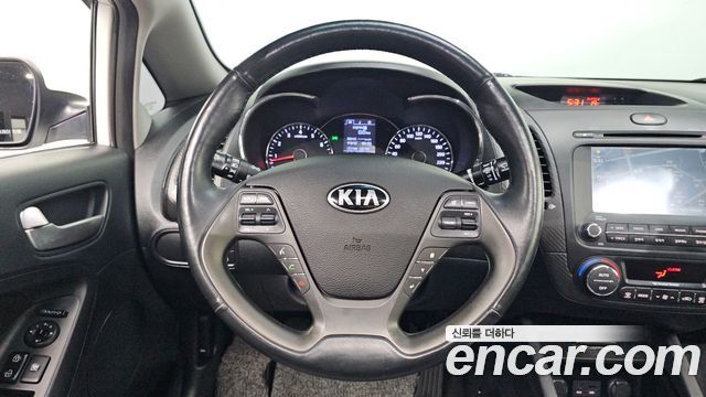 Kia K3 2015 — photo 15