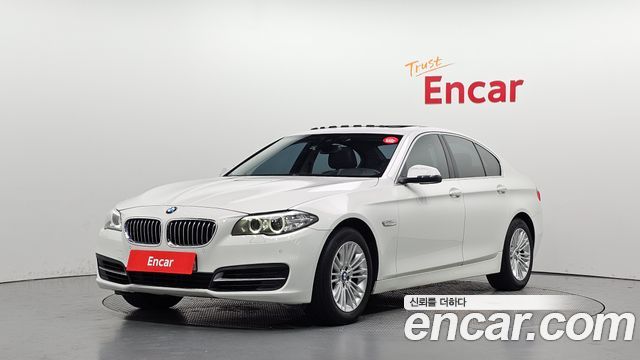 BMW 5-Series 2014 — photo 1