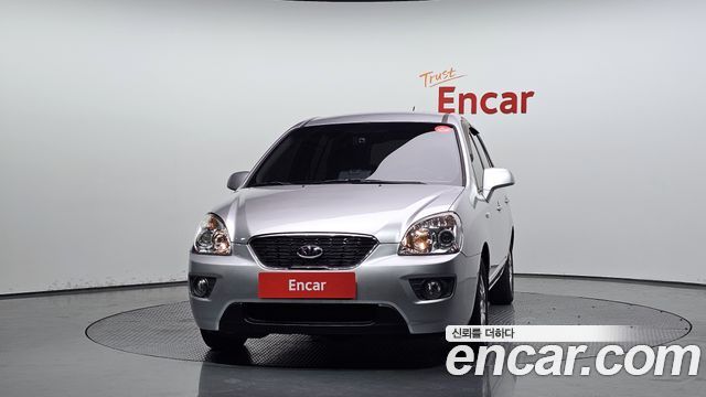 Kia Carens 2011 — photo 3