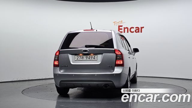 Kia Carens 2011 — photo 4