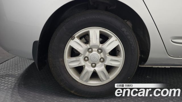 Kia Carens 2011 — photo 5