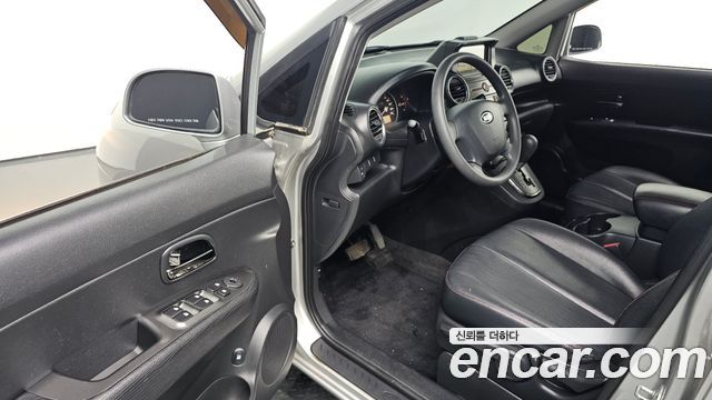 Kia Carens 2011 — photo 13