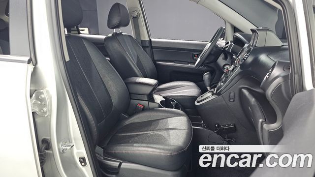 Kia Carens 2011 — photo 16