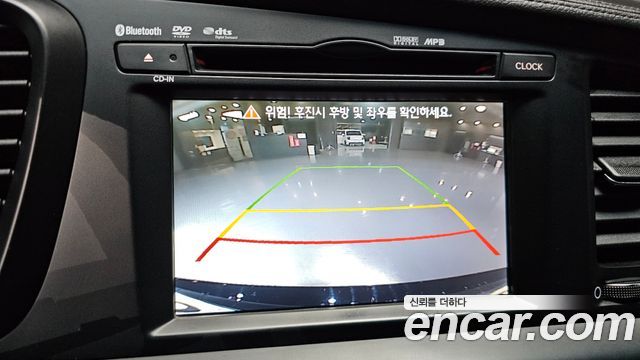 Kia K5 2011 — photo 17