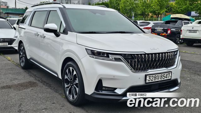 Kia Canival 2021 — photo 2