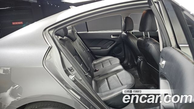 Kia K3 2013 — photo 17