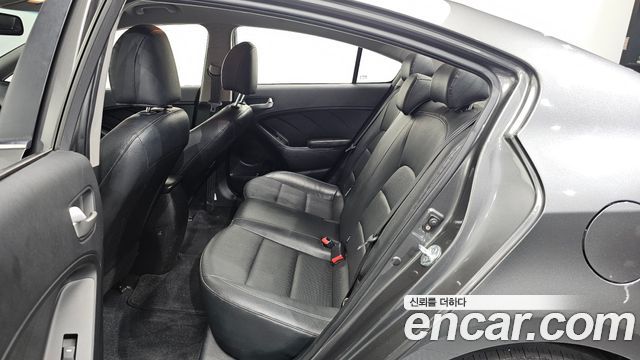 Kia K3 2013 — photo 18