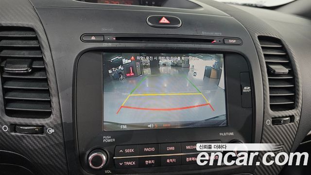 Kia K3 2013 — photo 21