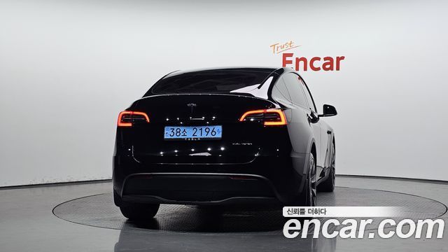 Tesla Model Y 2024 — photo 4