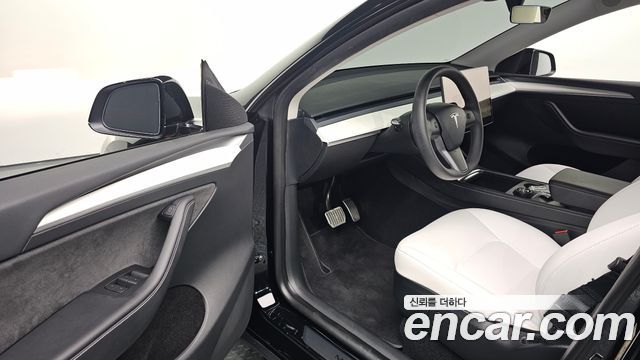 Tesla Model Y 2024 — photo 13