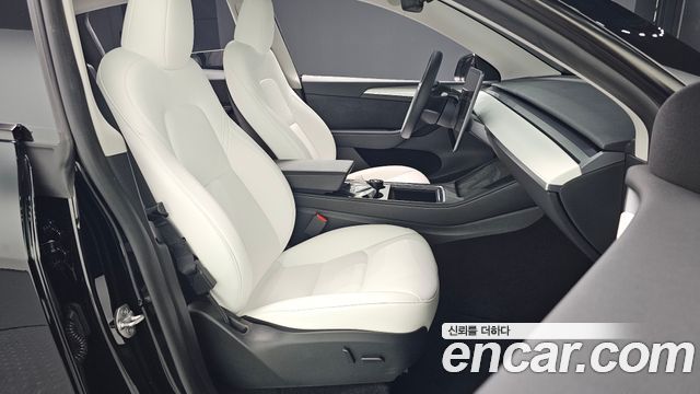Tesla Model Y 2024 — photo 16