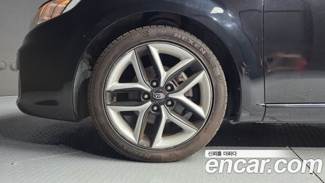 Kia Porte 2012 — photo 5