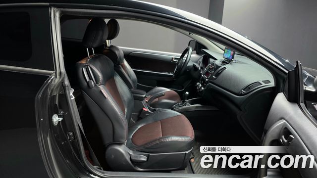 Kia Porte 2012 — photo 12