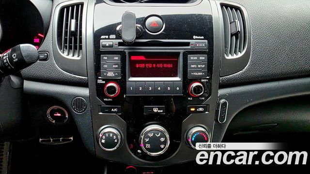 Kia Porte 2012 — photo 16