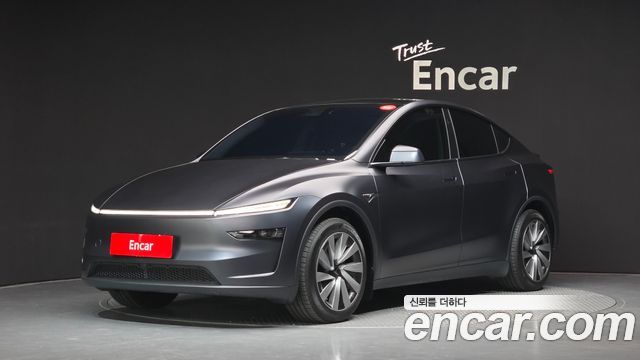 Tesla Model Y 2025 — photo 1