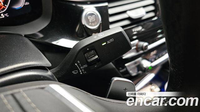 BMW 5-Series 2023 — photo 28