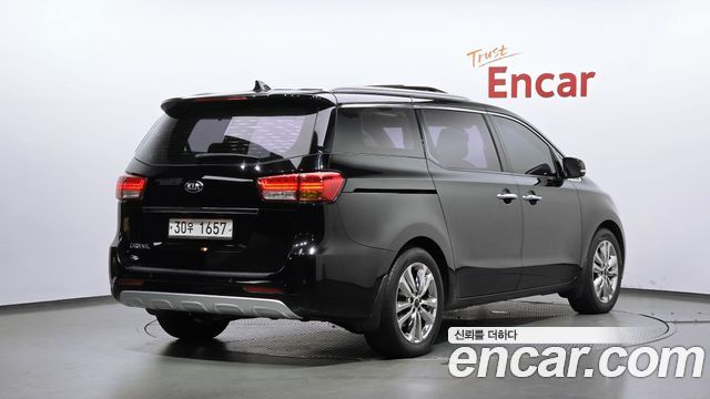 Kia Canival 2015 — photo 2