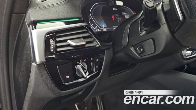 BMW 5-Series 2023 — photo 23