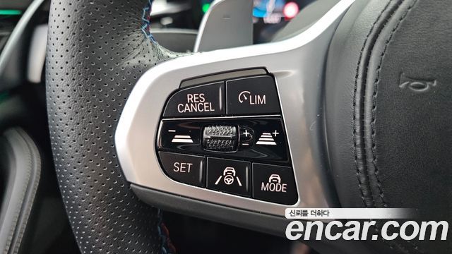 BMW 5-Series 2023 — photo 28