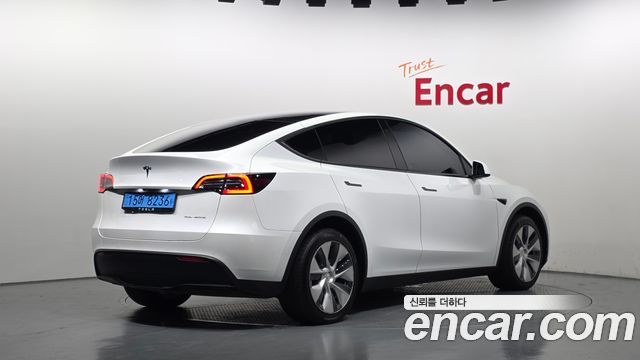 Tesla Model Y 2022 — photo 2