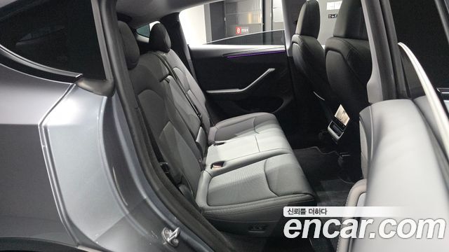 Tesla Model Y 2025 — photo 17