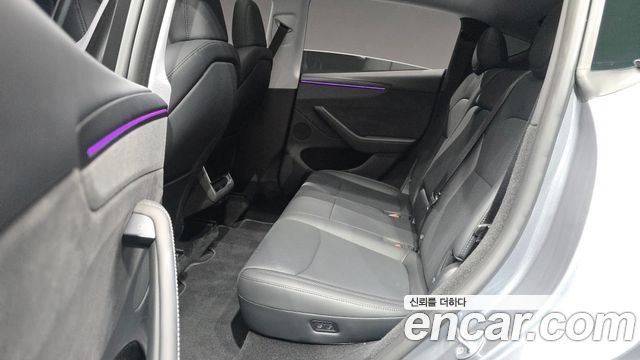 Tesla Model Y 2025 — photo 18