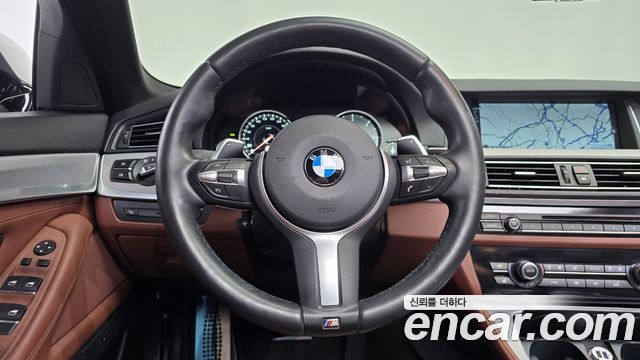 BMW 5-Series 2014 — photo 19