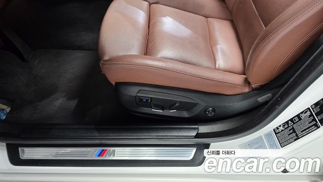 BMW 5-Series 2014 — photo 32