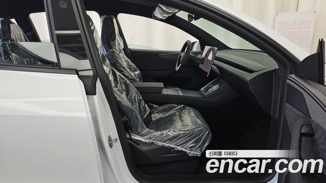 Tesla Model Y 2026 — photo 17