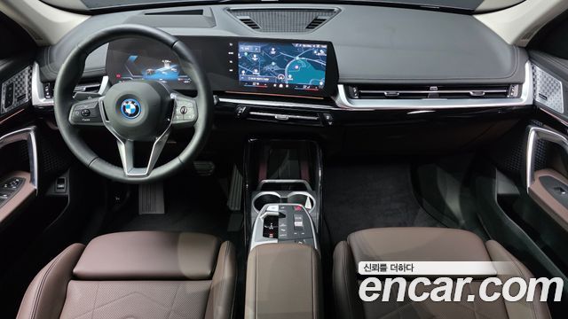 BMW iX1 2024 — photo 10