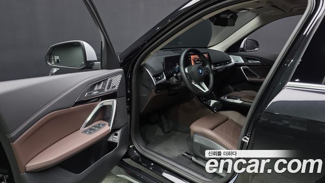 BMW iX1 2024 — photo 13