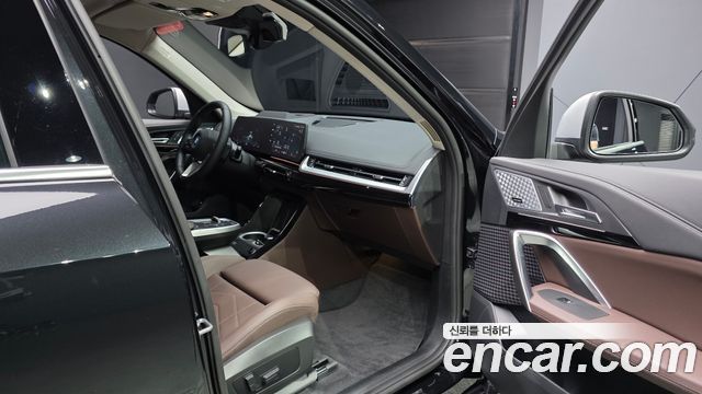 BMW iX1 2024 — photo 17
