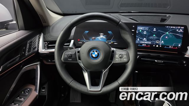 BMW iX1 2024 — photo 19