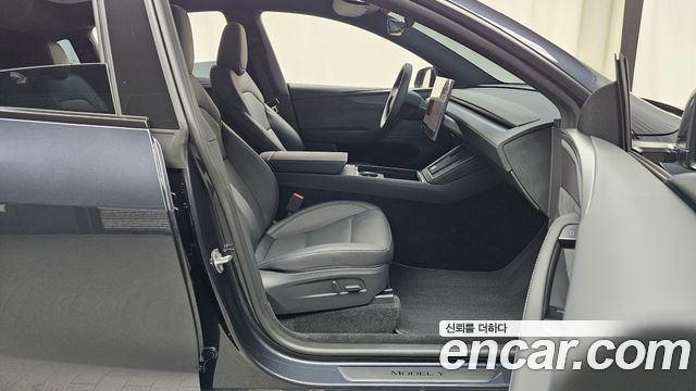 Tesla Model Y 2026 — photo 16