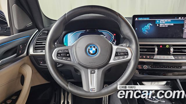 BMW iX3 2024 — photo 19