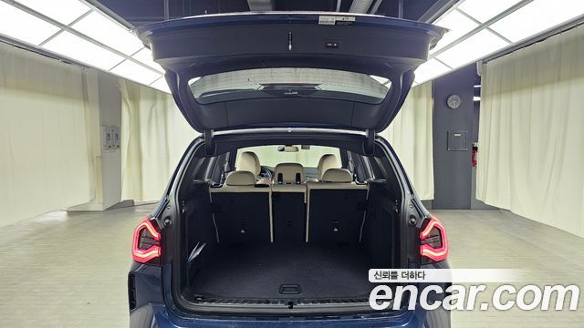 BMW iX3 2024 — photo 25