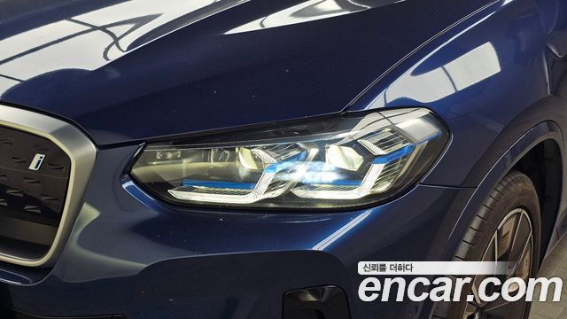 BMW iX3 2024 — photo 8
