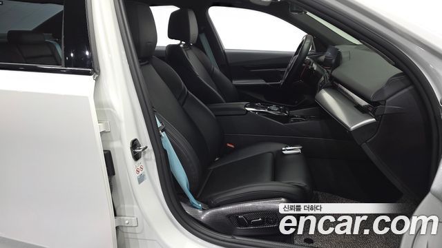 BMW 5-Series 2024 — photo 11