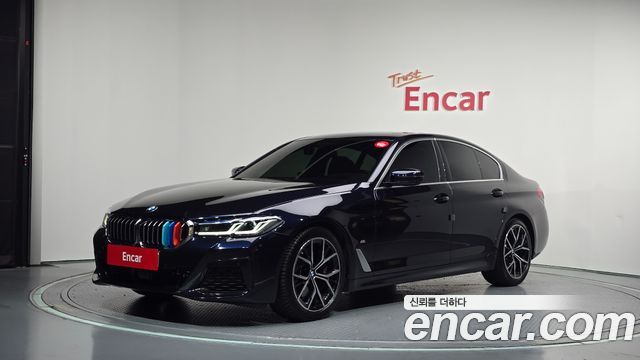 BMW 5-Series 2023 — photo 1