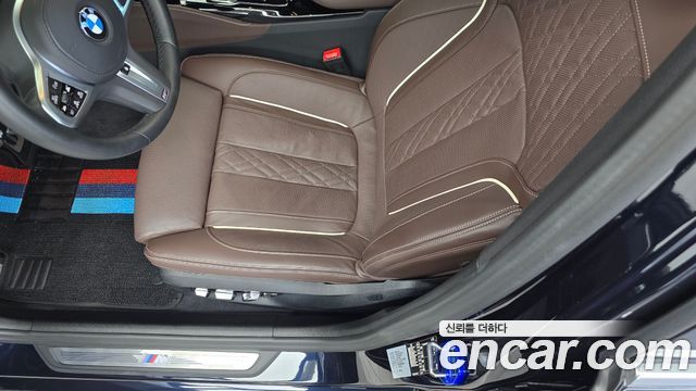 BMW 5-Series 2023 — photo 24