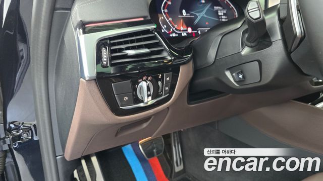 BMW 5-Series 2023 — photo 26