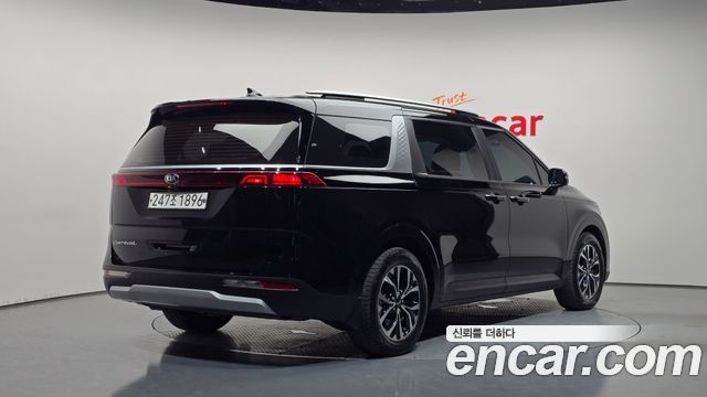 Kia Canival 2021 — photo 2